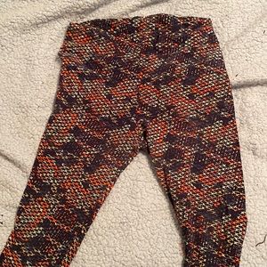 Lularoe leggings in a multi color kind of mesh looking pattern.